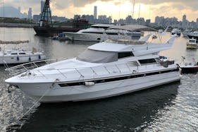 Simple White Motor Yacht for Charter in Hong Kong Island